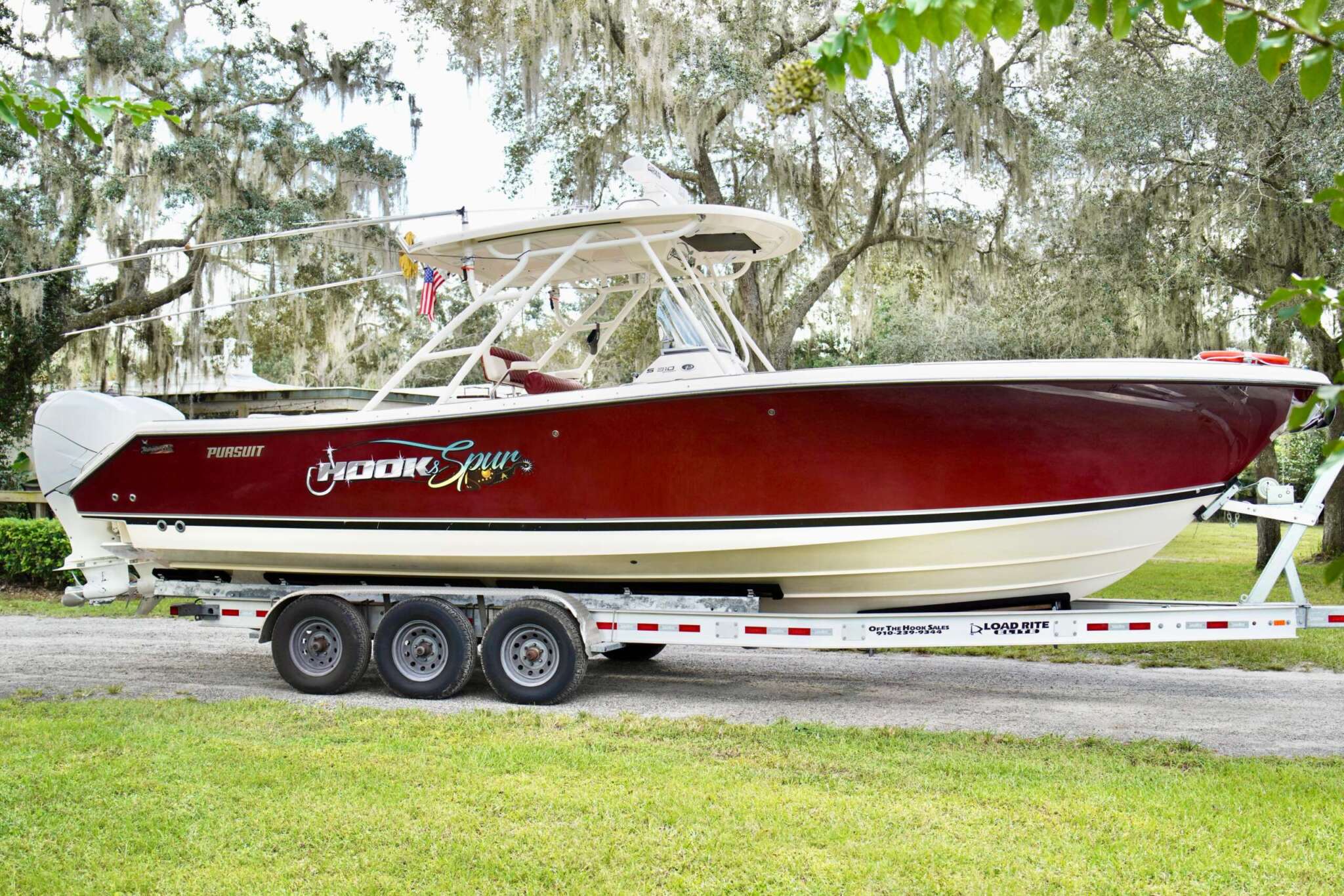 2012 - Pursuit - ST 310 Sport